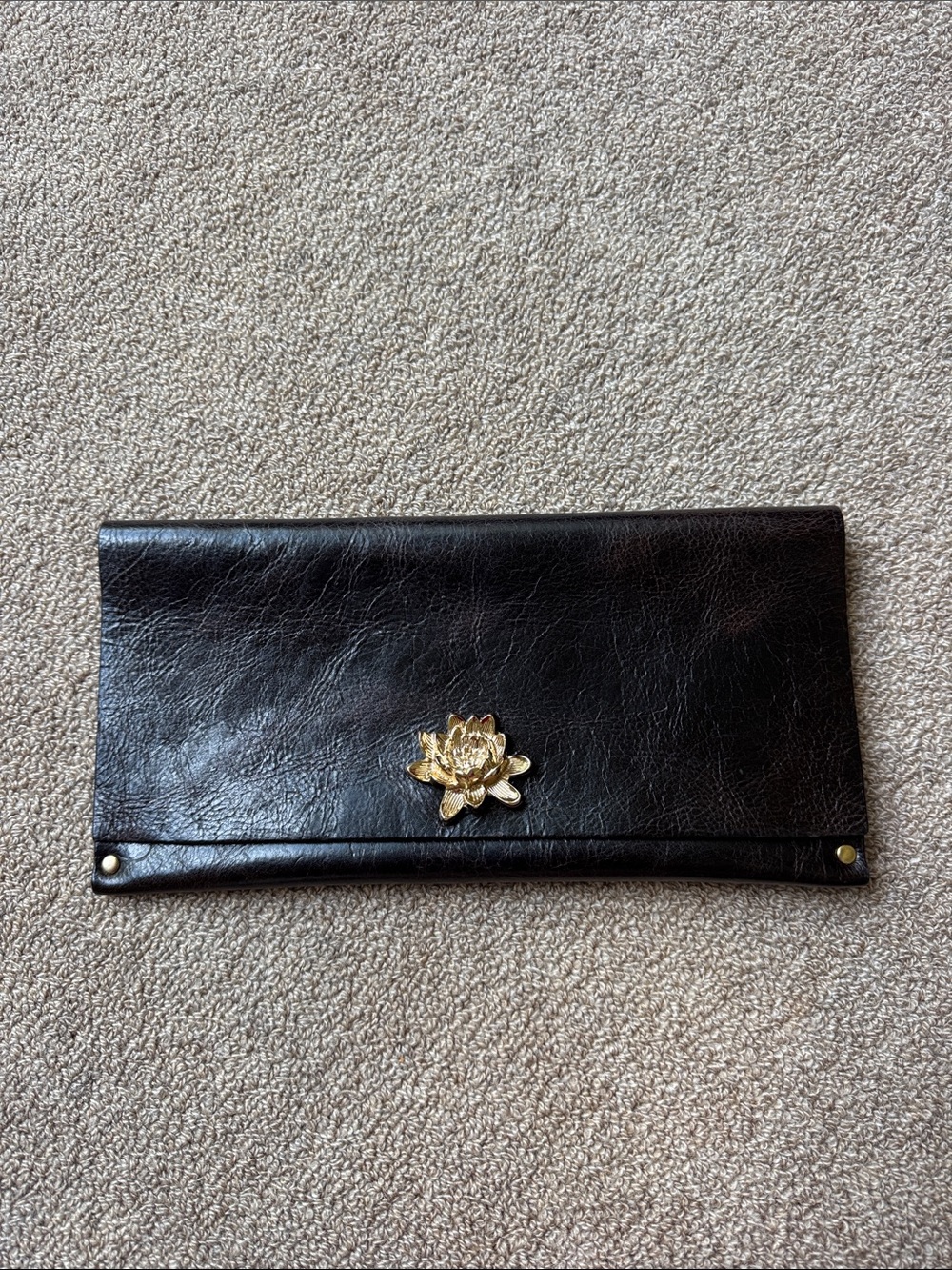 Moss Mills Dark Brown Leather Clutch with Gold Flower Accent